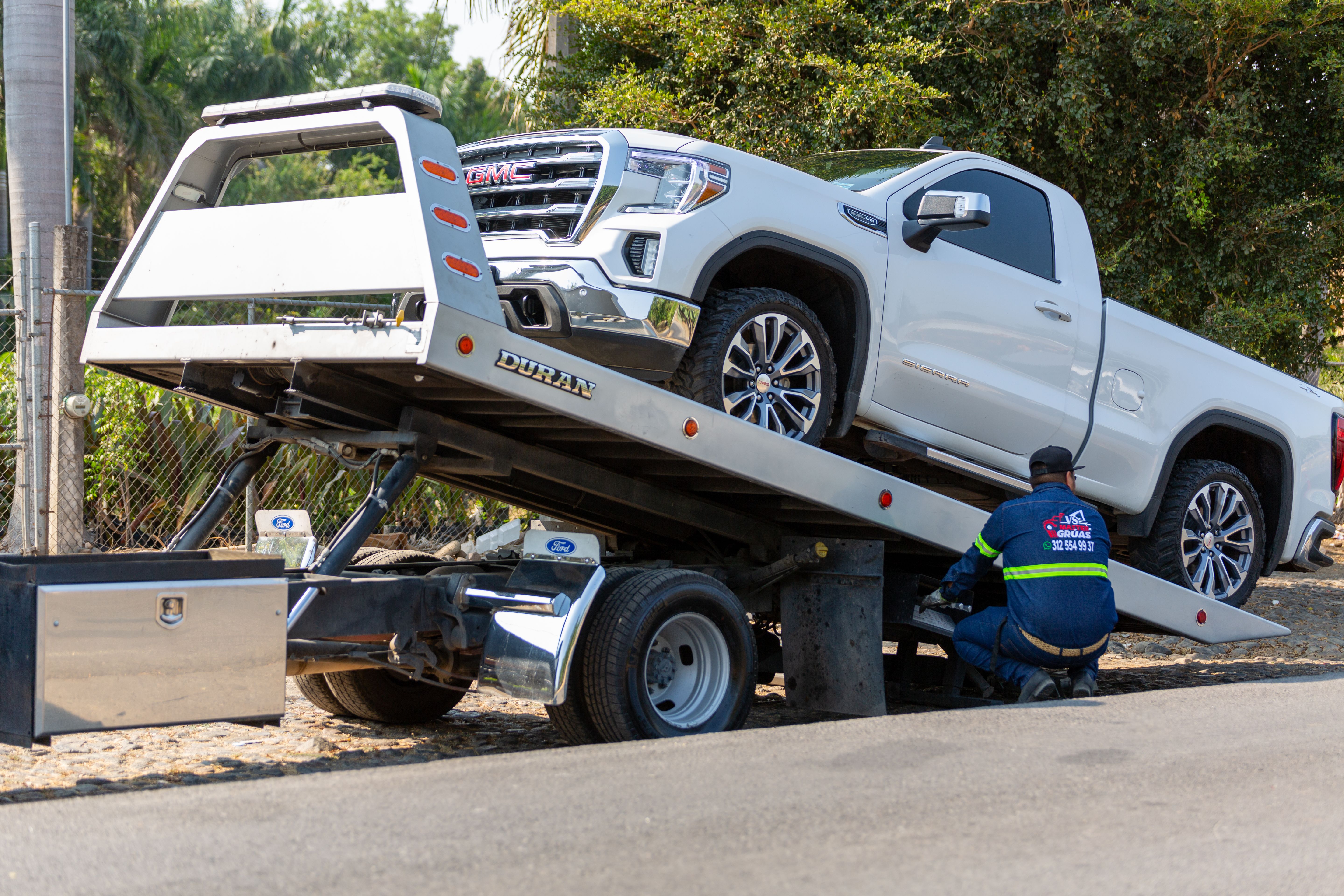Tow truck operator at work